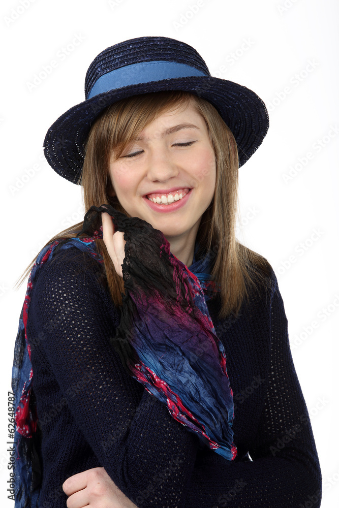 Smiling beautiful teenage girl with navy hat and closed eys Smiling beautiful teenage girl with navy hat and closed eys
