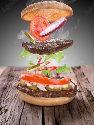 delicious hamburger on wood