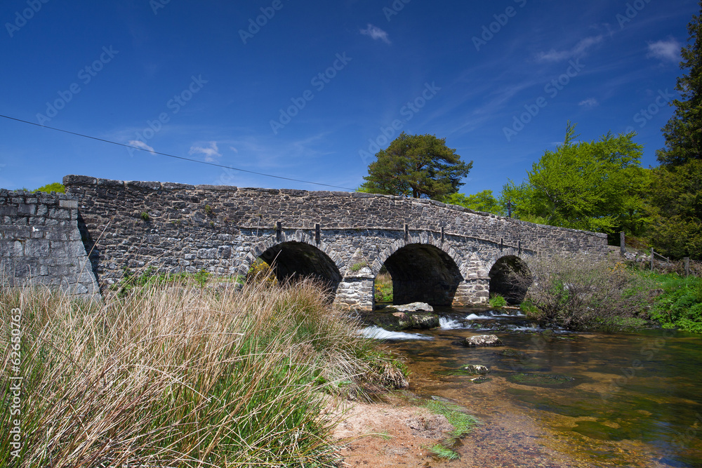 The ancient clapper bridge at Postbridges in Dartmoor National P
