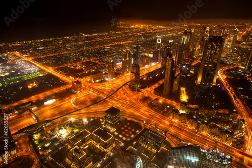 Dubai city with skyscrapers at night, United Arab Emirates