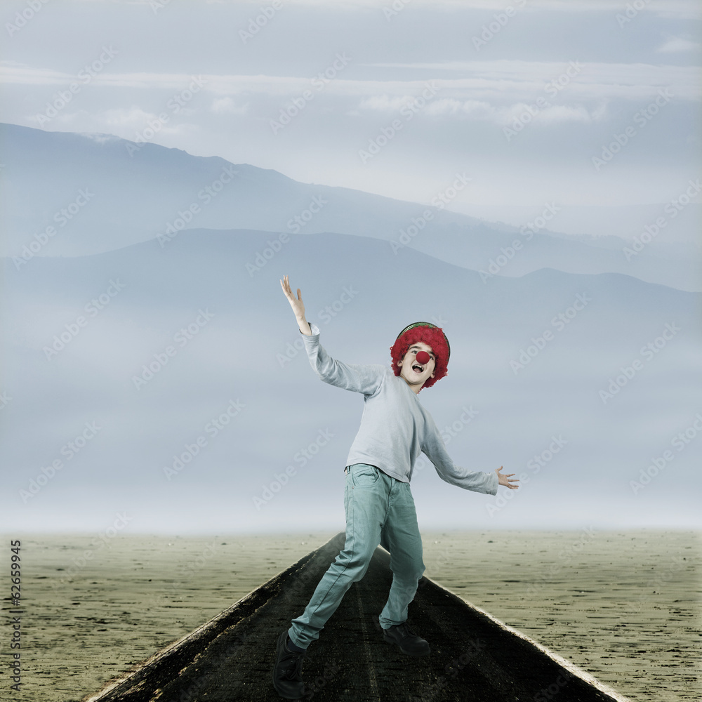 landscape of desert highway with the friendly clown