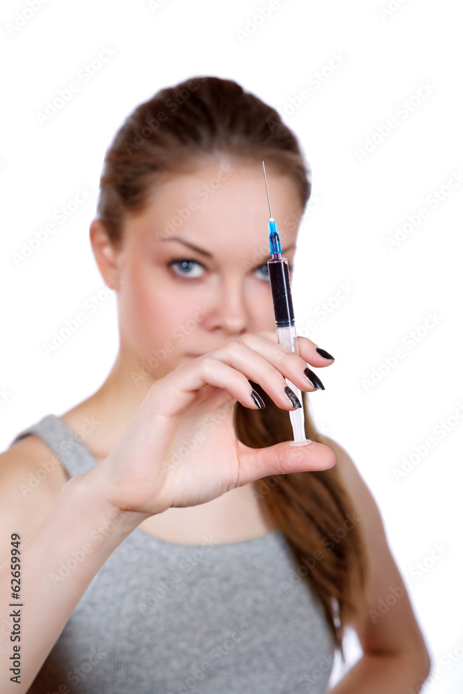 girl about a syringe in hand on white background girl about a syringe in hand on white background