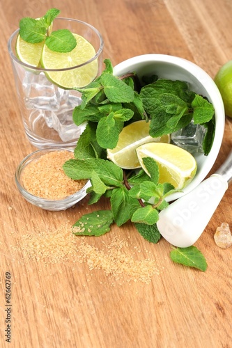 Ingredients for lemonade on wooden table