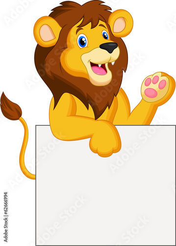 Fototapeta Naklejka Na Ścianę i Meble -  Happy lion holding blank sign