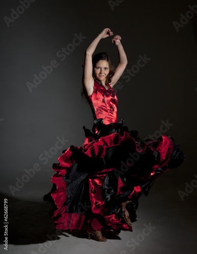 Young woman dancing flamenco