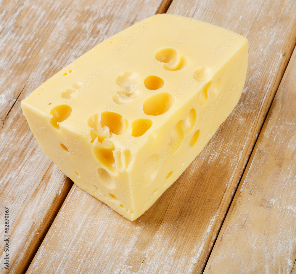 Cheese on wooden table Cheese on wooden table