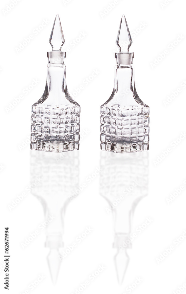two empty glass containers for sauces