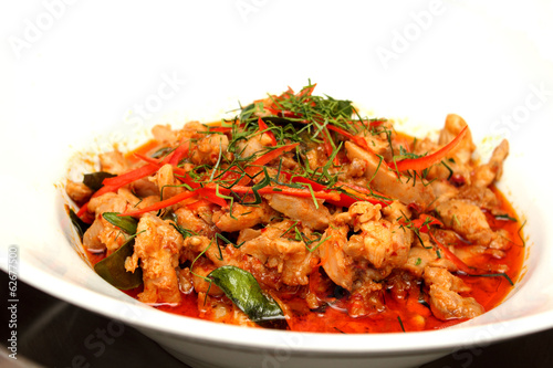 Pork red curry in a white bowle