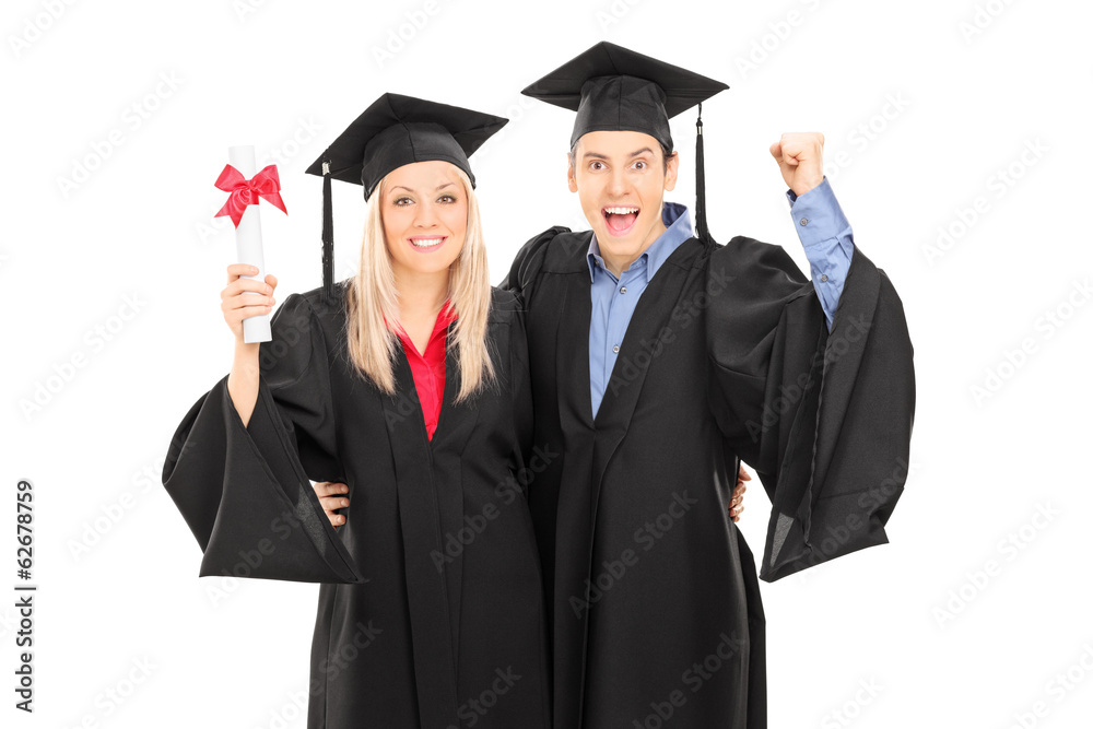Male and female student celebrating graduation Male and female student celebrating graduation