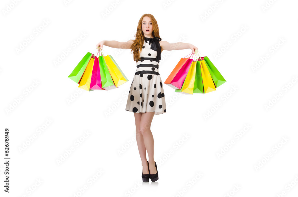 Young woman with shopping bags on white Young woman with shopping bags on white