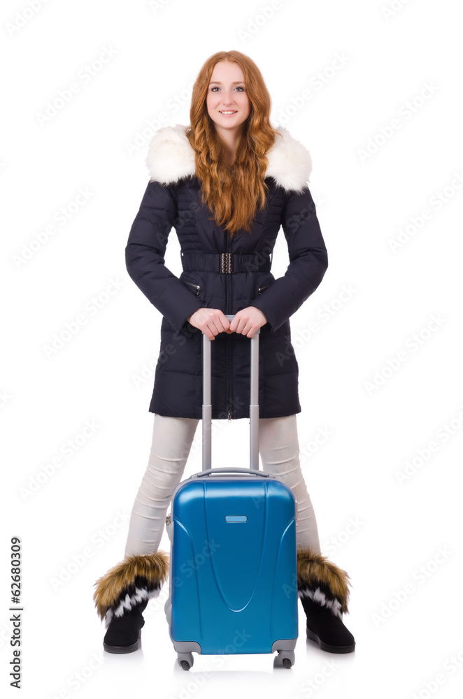 Woman with suitcase preparing for winter vacation Woman with suitcase preparing for winter vacation