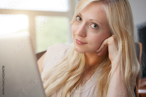 Blond woman with laptop