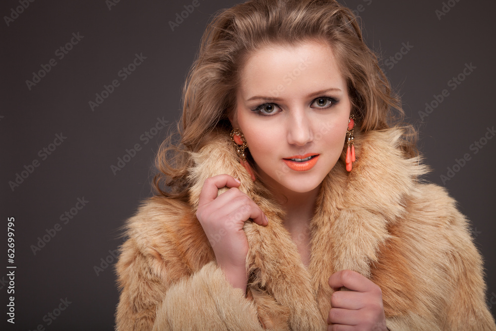 Beauty Fashion Model Girl in fox Fur Coat. Beautiful Luxury Beauty Fashion Model Girl in fox Fur Coat. Beautiful Luxury