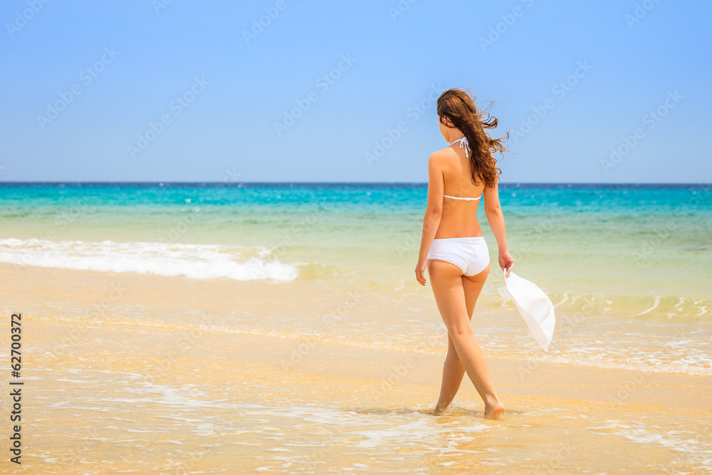 Young woman on ocean beach