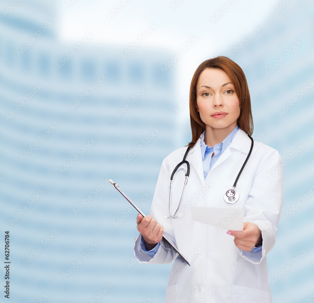 calm female doctor with clipboard