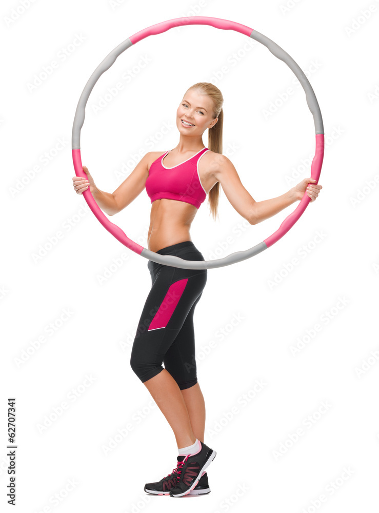 young sporty woman with hula hoop young sporty woman with hula hoop