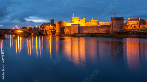 King John's castle reflected on the River Shannon at dusk, Limerick, Ireland photo