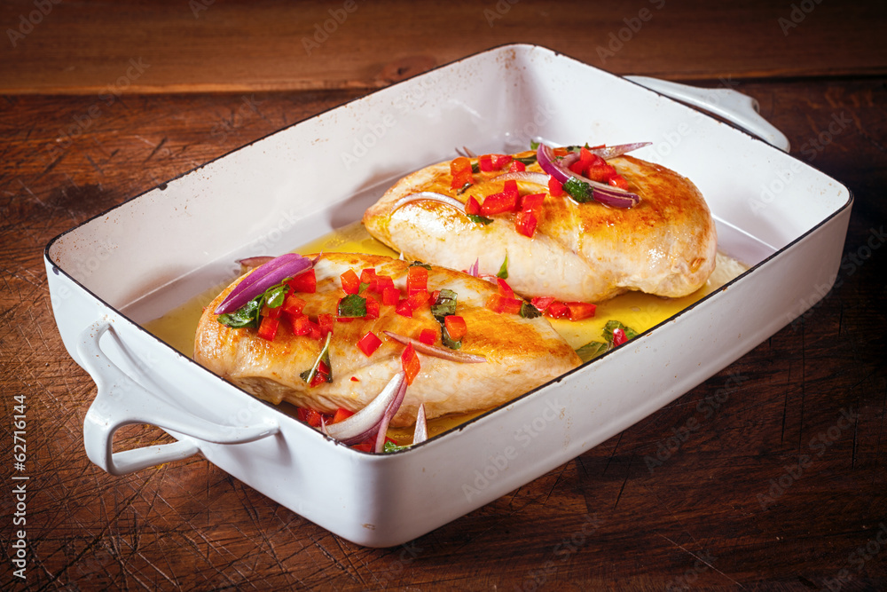 Roast chicken breasts in an oven dish Roast chicken breasts in an oven dish