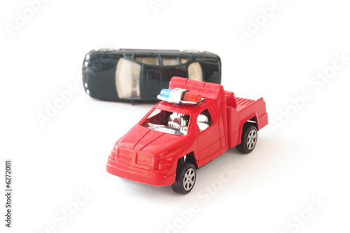 toy cars in accident on white background