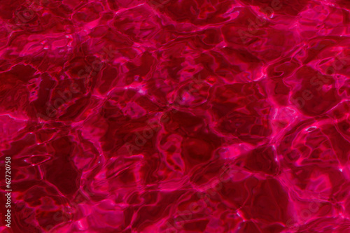 red abstract background of water surface