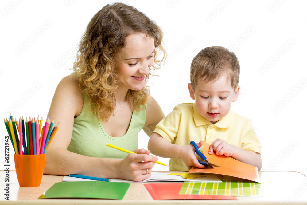 Mother and child draw and cut together Mother and child draw and cut together