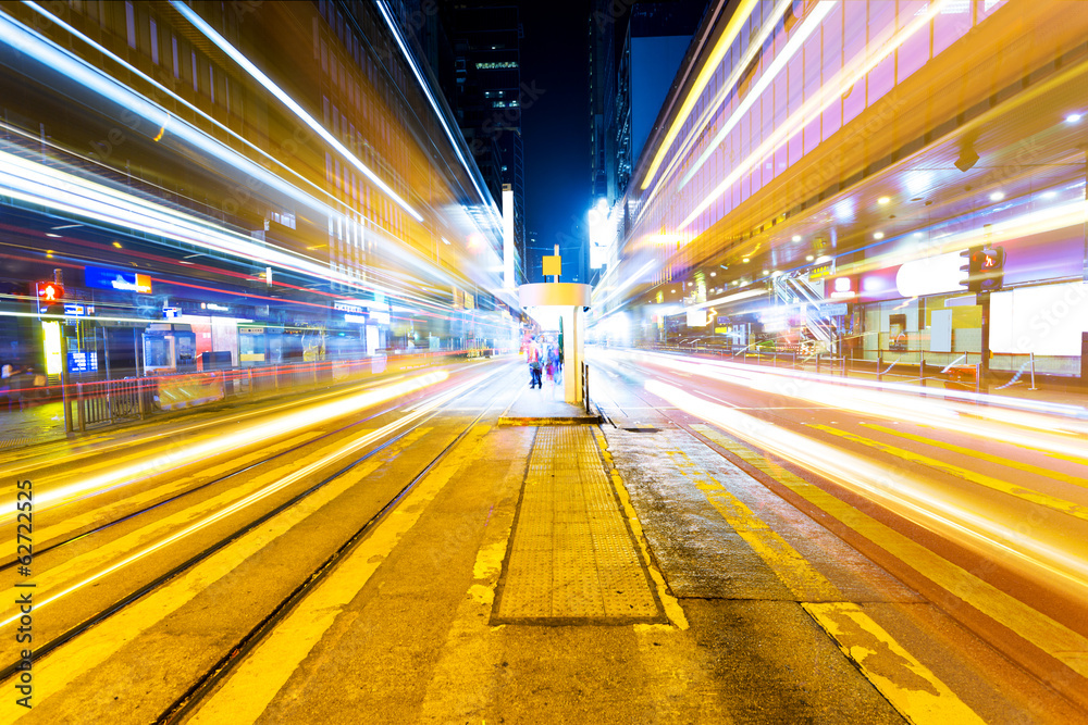 Naklejka premium ight trails on the street in Hong kong