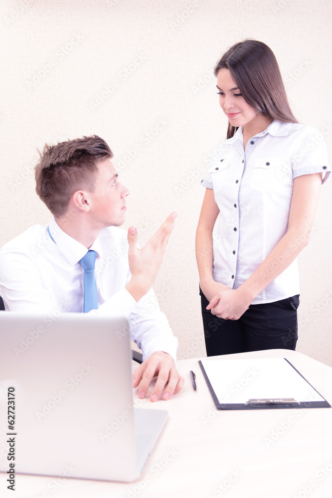 Successful young businesspeople working at office Successful young businesspeople working at office