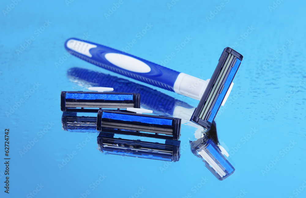Men shaver on light blue background