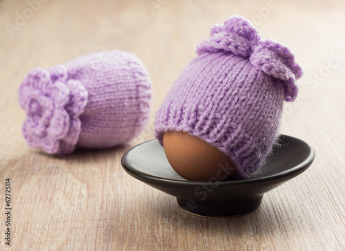 knitted egg warmers with crochet flower