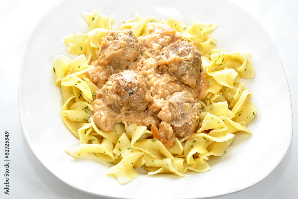 Swedish Meatballs Served on Buttered Noodles Swedish Meatballs Served on Buttered Noodles
