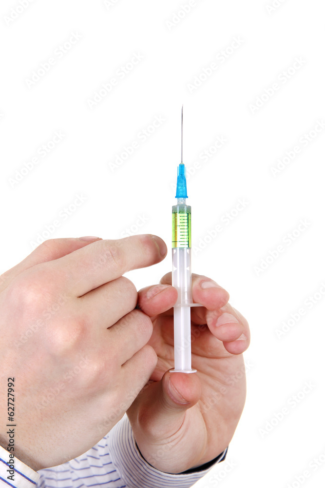 Syringe in a Hand Syringe in a Hand