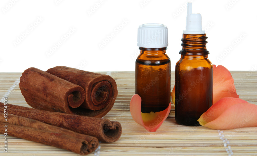 bottle of cinnamon essential oil - beauty treatment
