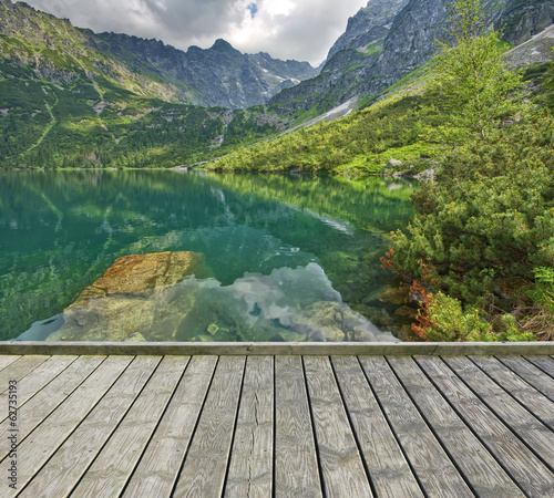 Pier with mountain lake