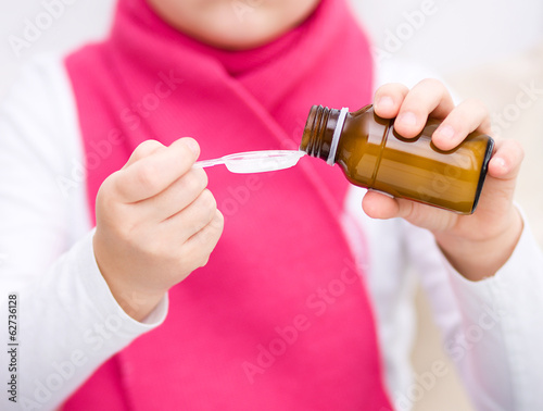 Hands holding medicine health care syrup