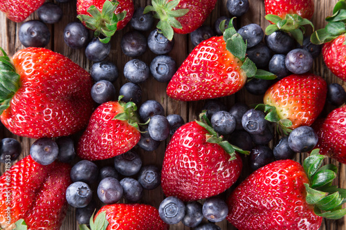 Fototapeta Naklejka Na Ścianę i Meble -  berries on wooden background.