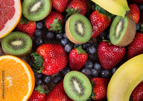 berries on wooden background.