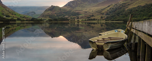 Photography Panorama landscape rowing boats on lake with jetty against mount