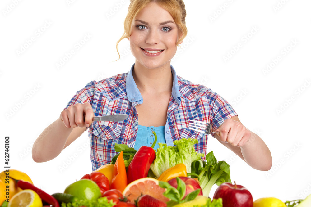 Beautiful woman with vegetables and fruits on table isolated on Beautiful woman with vegetables and fruits on table isolated on