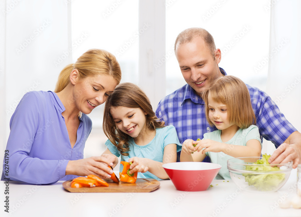 happy family with two kids making dinner at home happy family with two kids making dinner at home