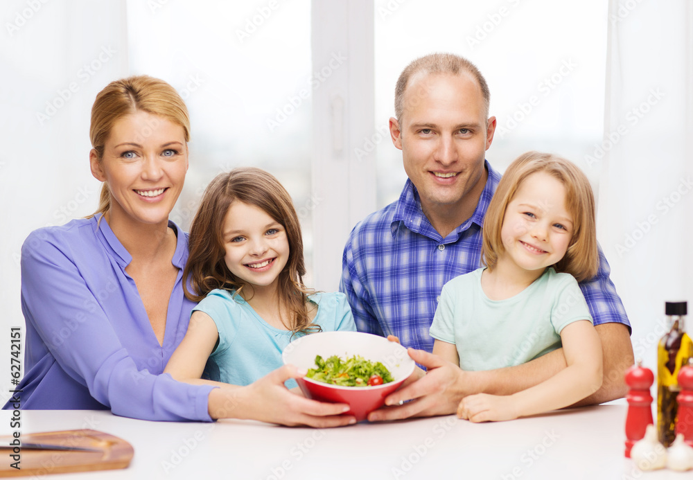 happy family with two kids with salad at home happy family with two kids with salad at home