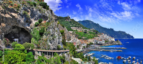 scenic Amalfi coast, view with cave and serpantine road photo
