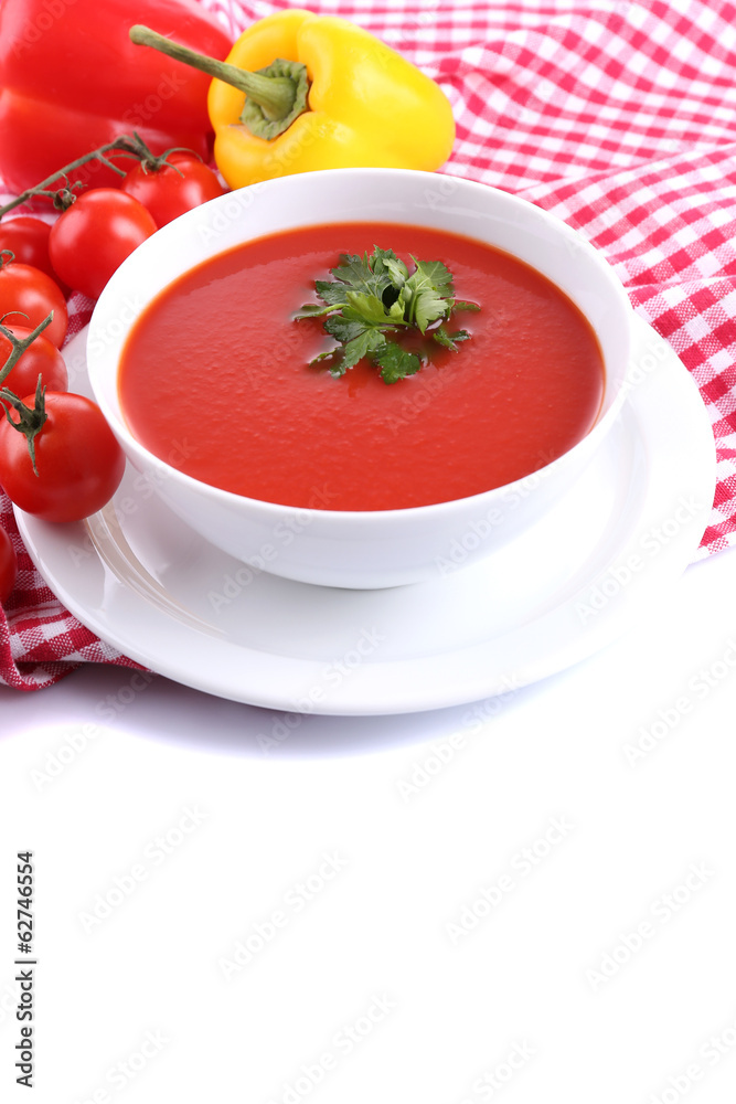 Tasty tomato soup and vegetables, isolated on white Tasty tomato soup and vegetables, isolated on white