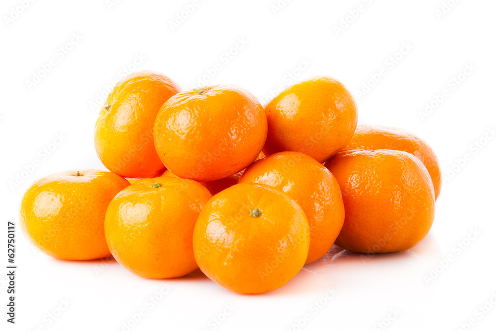 ripe juicy tangerine on a white background. Clementine Mandarin ripe juicy tangerine on a white background. Clementine Mandarin