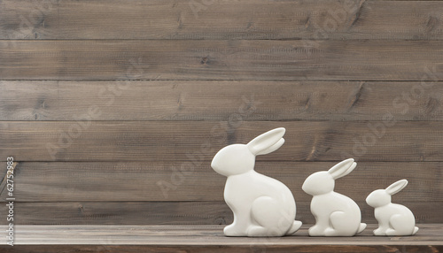 Canvas Print easter bunny over wooden background