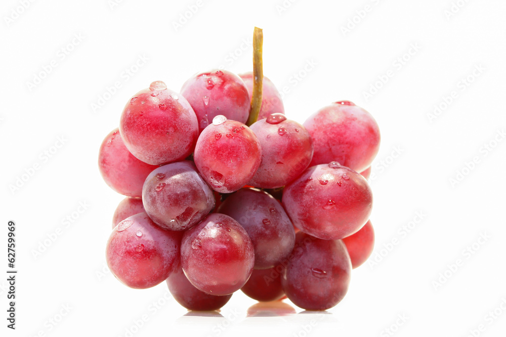 Red grape isolated on white.
