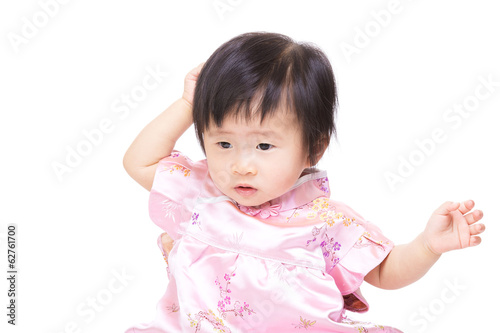 Chinese baby girl touch her hair