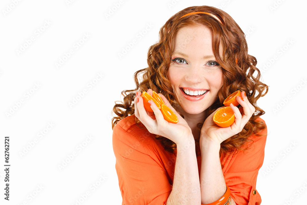 Portrait of a beautiful young woman with red hair oranges Portrait of a beautiful young woman with red hair oranges