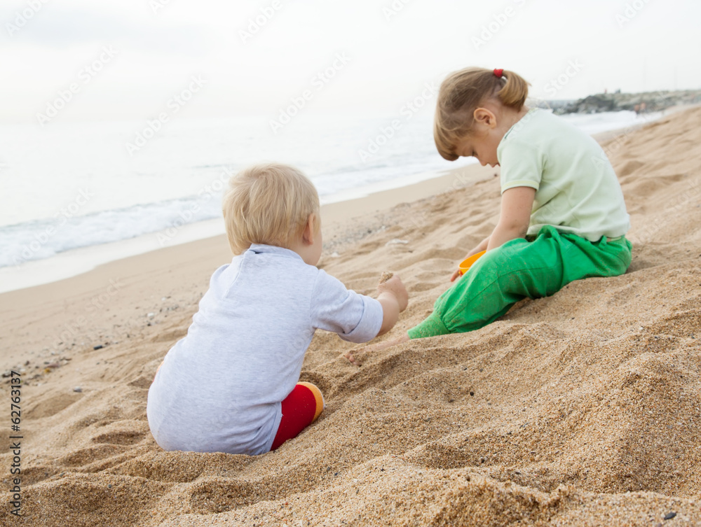 girls playing on the beach