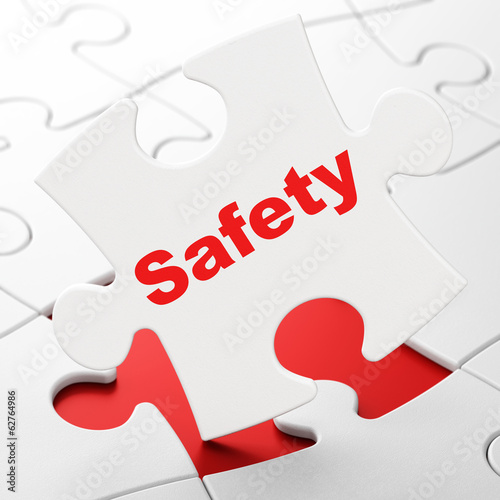 Security concept: Safety on puzzle background