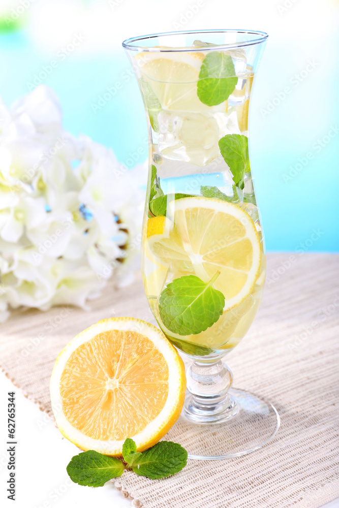 Glass of cocktail with lemon and mint Glass of cocktail with lemon and mint